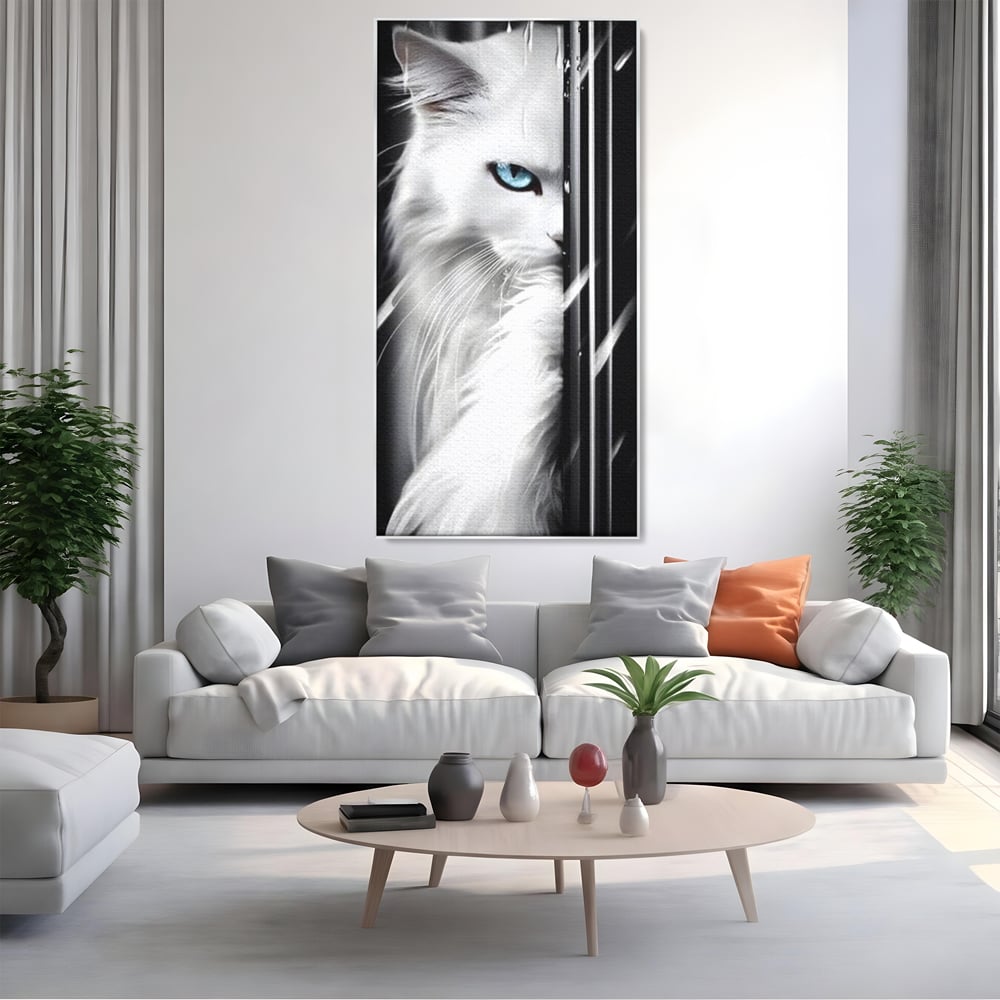 Tablou canvas cu tablou canvas cu pisica alba si ochi albastri, in rama de aluminiu argintiu, pe perete intr-un living
